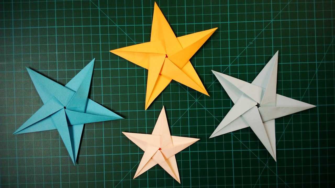 Сделать звезду из бумаги на 9. Оригами звезда. Оригами звезда четырехконечная. Объемная звезда из бумаги. Звезда оригами объемная.