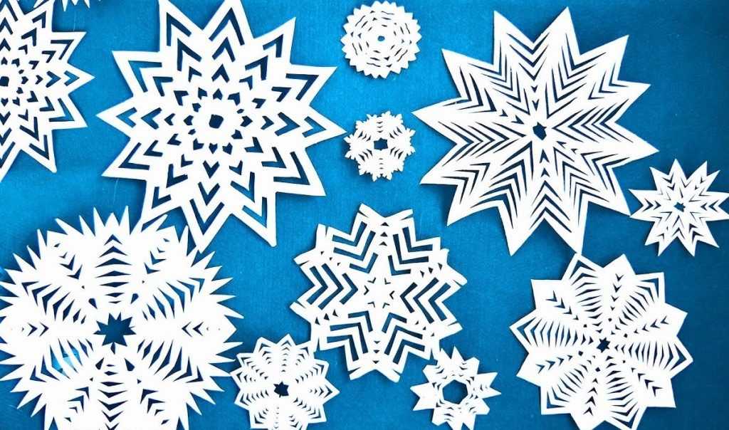 Красивые снежинки из бумаги, как вырезать снежинки на новый год своими руками